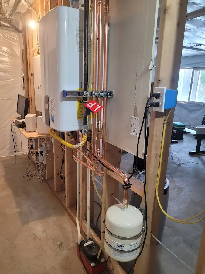Licensed plumber repairing a kitchen sink in Forest Oaks